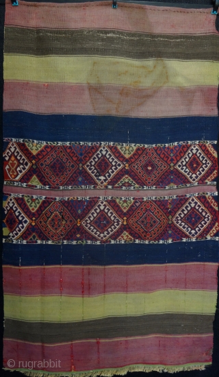 Pair of late 19th century Anatolian Malatya dowry chuvals. 163cm x 100cm and 143cm x 100cm. Finely embroidered silk panels on woven wool kilim foundation with striped skirts, angora tassels in centre  ...