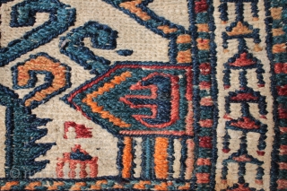 Antique chanteh or salt bag adapted from a section of a wide tent band with interesting design and good colours. Size: two sides each 32cm x 26cm.

One of the weavings from a  ...