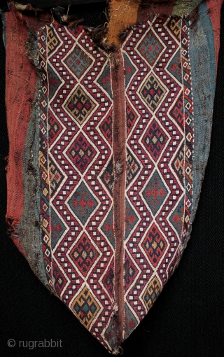 Antique Anatolian chuval from East Anatolia with intense natural dyes.

An unusual survivor, a 19th century East Anatolian chuval with beautiful natural dyes in original condition with old nomadic patch repairs and some  ...