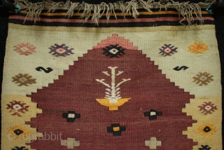 An interesting small Muhajir prayer kilim with çiçim embroidered burdock motifs and minimalist tree of life - bowl? motif in the prayer niche and striped kilim ends. This unusual kilim with some  ...