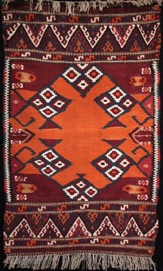 Two small collectible, related but different Helvaci Manastir kilims,the first older with natural orange (or your money back!), the second with interesting asymmetrical colour arrangement in the field, natural and aniline dyes.  ...