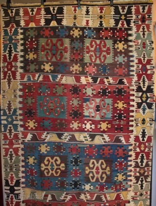 Large mid 19th century central Anatolian kilim
is it from central Anatolia (Taspinar?) or even Cappadocia? The jury is still out as no directly comparable examples have yet come to light!

Acquired between 1909  ...