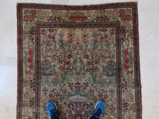 Old and fine Isfahan "vase" rug with a beautiful patina (207 cm x 137 cm)

This rug is full of life, with many animals and plants.
Small amount of repiling, ends secured, needs a  ...