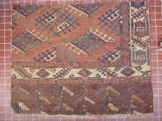 Fragment of a fine old Yomud main carpet.
A complete sample: border, skirt and field. As found condition, needs a bath and a good home.
104cm x 84cm       