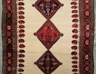 Unique, old and colorful 19th c. Farahan rug (190 cm. x 120 cm.) Lovely piece with soft wool and beautiful dyes on an ivory field. There's a reweave (see last picture), sides  ...