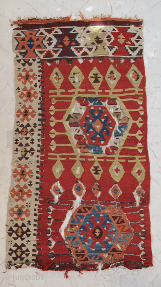 Antique Anatolian Aksaray kilim fragment (145 cm. x 75 cm.)
Old piece in need of a clever mounting to reach its full potential.
Sold as found, price unrelated to its beauty / age.

Rugrabbit website  ...