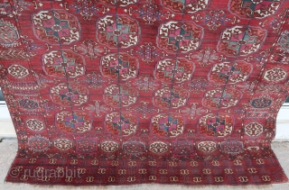 Old Tekke rug (256 cm. x 172 cm.)
In overall good condition for its age, ends secured, a repair in a corner, selvedges not original.
Shipping worldwide at cost      