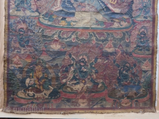 Antique, tibetan or nepalese Thangka painting, of the deity Mahottara Heruka in consort with Krodheshvari, central figure of the seven tiered, wearing a tiger's skin, trampling multiple figures under each foot, with  ...