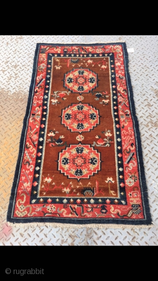 Tibetan rug, group flower pattern with Chinese Bogu veins selvage. Good age and condition. Size 138*75cm(53*29)                 