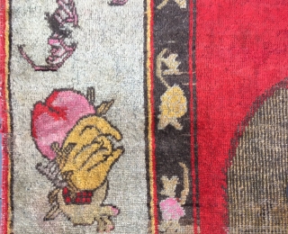 Chinese Xinjiang rug, red background with  little lion pattern, fruit veins selvage, the pronunciation of “tai Shi”, means an official position in ancient China. Good age and condition. Size 180*285cm(70*111”)  