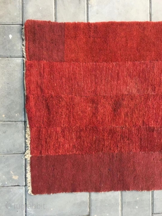 Tibetan rug, very nice red color, good age and wool quality, five strips are sewn together. Size 80*150cm (30*59”)
              