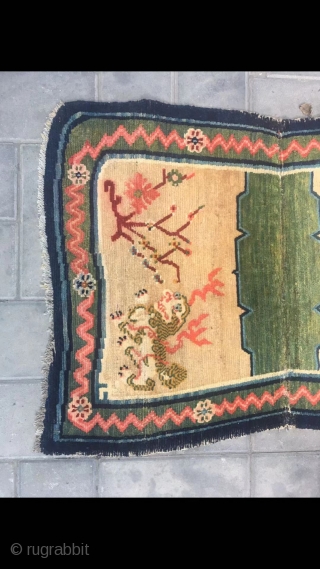 Tibetan horse saddle rug, Light camel background with  snow mountain lion pattern. Good age and condition. Wool warp and weft.
Size 95*62cm(37*24”)           