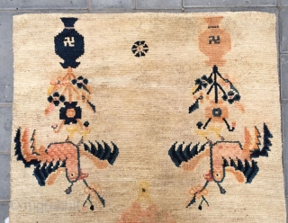 Tibet rug, The symmetrical pattern of golden chickens and vases and flowers is very interesting and rare. Good age and condition. Size 87*150cm(34*59”)          