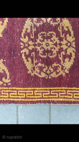 Tibet rug, red background with medallion flowers , good age and condition. Size 90*155cm(35*60”)                   