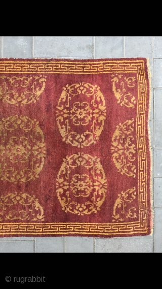 Tibet rug, red background with medallion flowers , good age and condition. Size 90*155cm(35*60”)                   