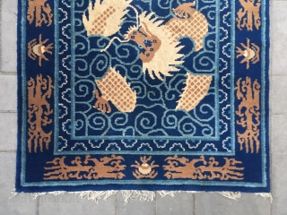 Chinese Baotou rug, blue background with nice dragon in the cloud pattern. Good condition. Size 100*200cm( 39*78”)                