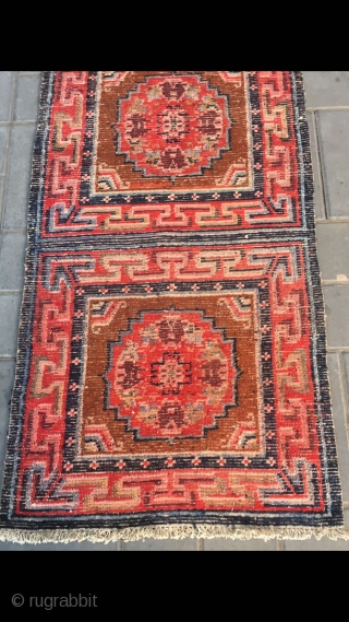 Tibet rug, three joined , red background with group flowers veins. Good age and condition. Size 68*190cm(27*74”)                