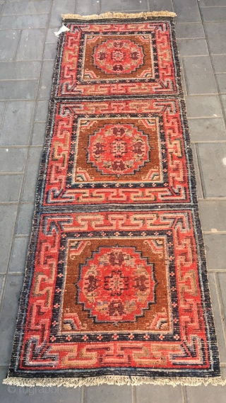 Tibet rug, three joined , red background with group flowers veins. Good age and condition. Size 68*190cm(27*74”)                