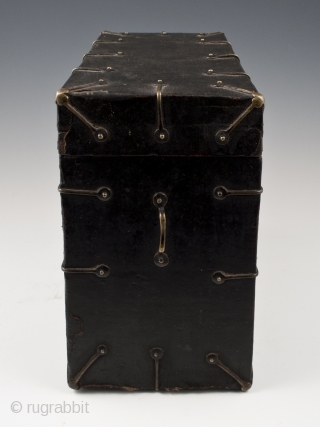 Black box, Tibet.
Wood, fabric, brass.
8" (20.2 cm) high, 10.5" (26.2 cm) wide, 5" (12.7 cm) deep.
Late 19th to very early 20th century.
This fabric-covered wood box tapers slightly toward the top, as seen  ...