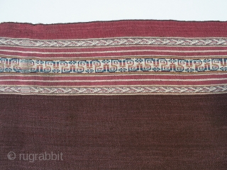 Ahuayo (woman's mantle), Aymara culture, Potosi/Oruro, Bolivia. Camelid yarns, natural dyes, pre-1850. 47.5" 120.6 cm) high by 43" (109.2 cm) wide. The weaving of this piece is unique to the Aymara people  ...