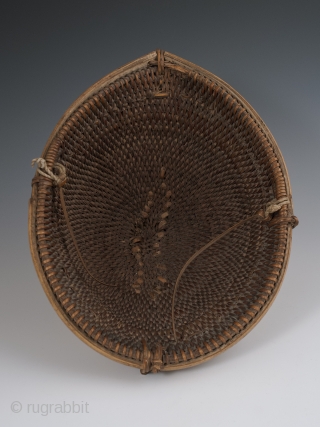Helmet, Padam (Adi), Arunachal Pradesh, India. Early 20th century, split bamboo cane. These were worn to indicate a man's status and identity.
           