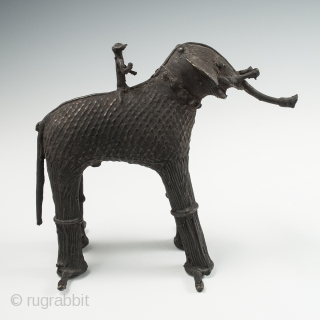 Elephant and rider, Kondh people, Orissa, India. Cast copper alloy, 5.25" (13 cm) high, Late 19th to early 20th century, Ex. Al Farrow. A bridal dowry sculpture in the form of an  ...