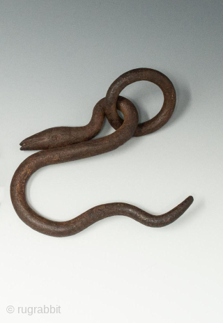 Iron hook and snare, Nepal. Measures 9.5 inches (24 cm) high by 4.5 inches (11.4 cm) diameter for the ring. 19th to early 20th century.

A rare, esoteric device used by Buddhist Tantric  ...