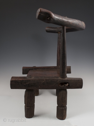 Small chair,
Dan tribe, West Africa.
15" (38 cm) high by 17.75" (45 cm) wide by 12" (30.5 cm) deep.
Mid 20th century.             