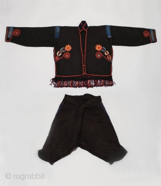 Man's ceremonial (cofradía) outfit, Chichicastenango, Guatemala. Wool, silk thread, Mid-20th century. 25" (63.5 cm) shoulder to hem by 59" (274 cm) across shoulders. It is rare to find a complete cofradia outfit  ...