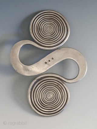 Apron counter weight, Miao or Dong culture, Guizhou, Hunan or Guangxi Province, China. Silver, 5.5" (14 cm) high, 136 grams. Early 20th century.
          