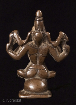 Ganesha, remover of obstacles, god of wisdom and prudence, India.
Lost wax cast bronze.
1 3/4 " (4.4 cm) high.
16th century.
#3522              