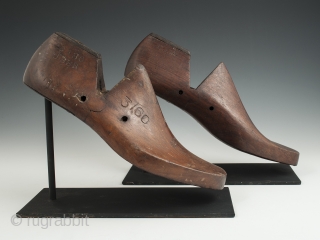 Shoe lasts, USSR. Wood, metal. Early 20th century. 10.75" (27.3 cm) and 11.25" 28.6 cm) long. Not quite a matching pair of old shoe lasts, purchased in Japan but made in the  ...