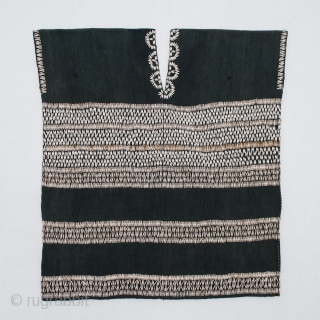 Woman's blouse or tunic, Karen ethnic group, Burma. Cotton, Job's tears (Coix lacryma-jobi). 31" (38 cm) high by 29" (71 cm) wide. Mid-20th century. In excellent condition with only a couple of  ...