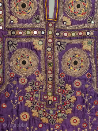 Beautifully embroidered dress from from the Sindh area of Pakistan. Early to mid 20th century.  29" high by 20" wide. Great condition, with all mirrors in place, a few with hairline  ...
