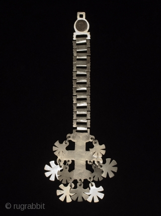 Trapelacucha pectoral, Mapuche, Chile. Nickel silver. 11" (28 cm) high by 4" (10 cm). Early to mid-20th century.               