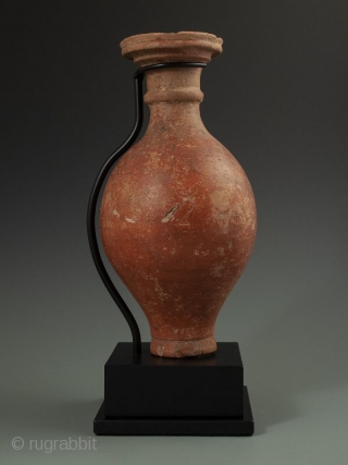 Antique Roman Vase with Stand

Red clay Roman pottery vessel with handle, flanged lip over curved body, worn white design, most likely a wine ewer, display stand.

Provenance Handley Collection 

Date 300 AD 

Size  ...