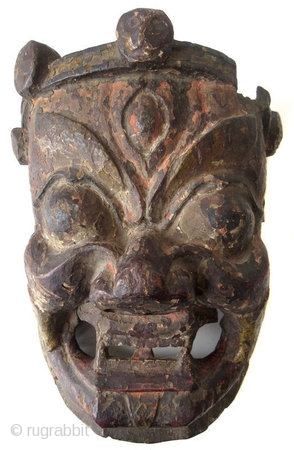 Antique Tibetan Carved Wooden Mask

Antique Tibetan hand-carved wooden deity mask,  Mahakala, a very fierce and powerful being and counterpart to Kali / Mahakali. His name means "Greater than Time" as he  ...