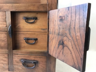 Antique Japanese Choba Tansu
An antique Japanese Choba (merchant) Tansu of hinoki wood and iron hardware. The top section has one large drawer with two handles. The middle section has two sliding doors  ...