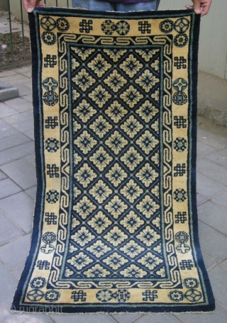 No.L20 * Chinese Rug . Origin: Baotou. Shape: Rectangle Age: About 100 Years Old Size: 66x127cm(26"x50"). Material: 100% Wool Woven: Hand-knotted Background Color: Off-whites,lvory. Flower lattice pattern in the field.The border with  ...